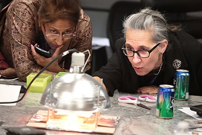 Teachers build and test affordable hands-on lesson plans at a Teacher Liaison workshop at the Space Foundation Discovery Center.