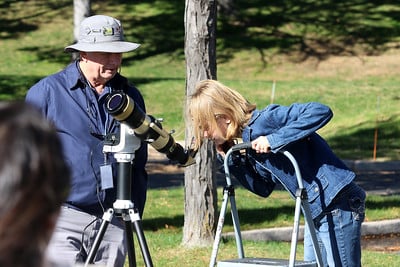 Student with telescope